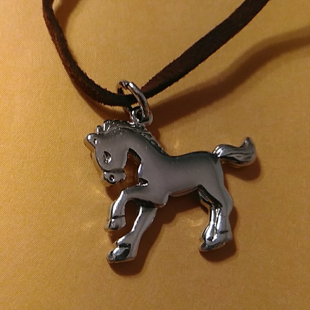 LIA SOPHIA Leather neckace with metal horse charm.